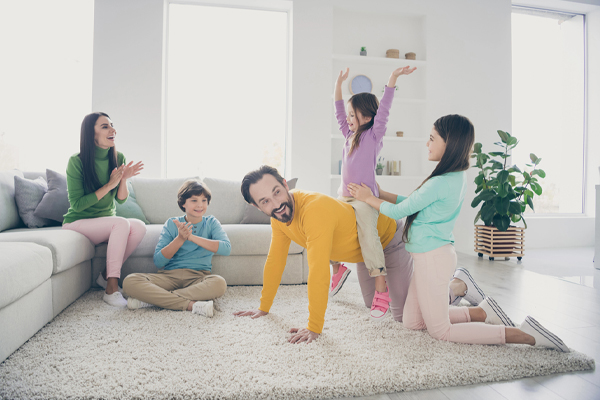 family enjoying indoor comfort in winter depicting heating system efficiency and comfort